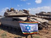 Gay Israeli Soldier Proudly Displays LGBTQ Flag On Gaza Soil